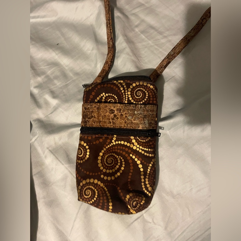 Brown and tan patterned crossbody bag